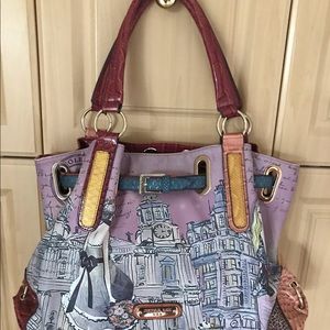 Handbag with zippered compartments inside and out.